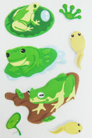 친절한 밝은 초록색 만화 개구리 모양 생태가 연약한 솜털 모양 PVC에 의하여 뚱뚱한 스티커 농담을 합니다